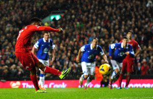 LIVERPOOL, ENGLAND - JANUARY 28: Daniel Sturridge of Liverpool takes a penalty kick , but puts his attempt wide of the target during the Barclays Premier League match between Liverpool and Everton at Anfield on January 28, 2014 in Liverpool, England. (Photo by Laurence Griffiths/Getty Images)