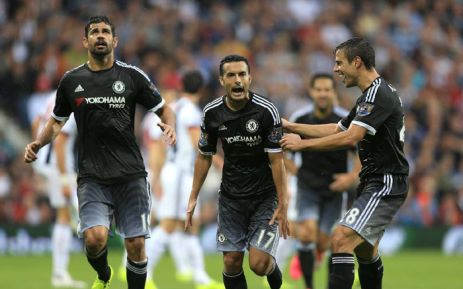 Pedro celebrating a goal with his Chelsea teammates. (Getty Images)