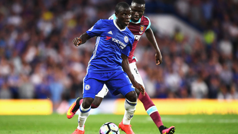 Chelsea's N'Golo Kante shields the ball from West Ham's Cheikhou Kouyate. (Getty Images)