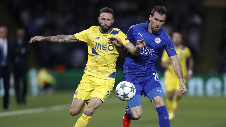 Christian Fuchs (right) playing for Leicester City.