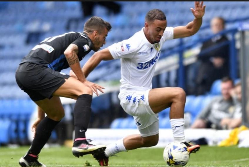 Leeds United forward Kemar Roofe dribbles past his opponent. (Getty Images)