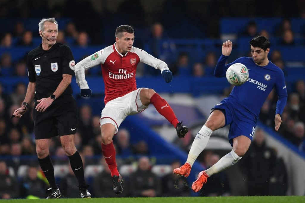 Arsenal midfielder Granit Xhaka (middle) in action against Chelsea.