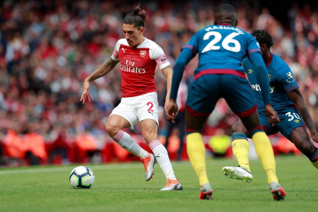 Hector Bellerin (left) while playing for Arsenal.