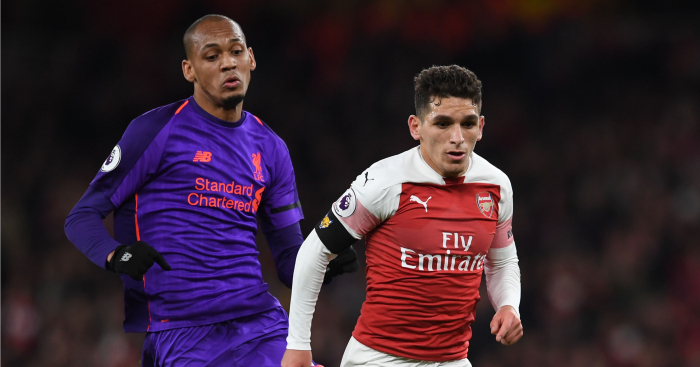 Arsenal's Lucas Torreira fights for the ball against Liverpool's Fabinho. (Getty Images)