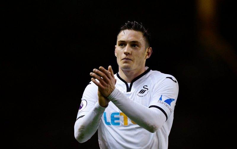 Swansea City defender Connor Roberts applauds the fans after the game. (Getty Images)