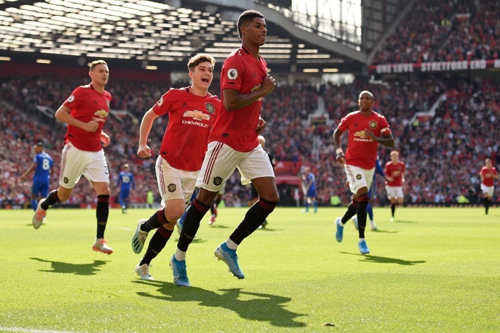 Manchester United players celebrate a goal against Leicester City at Old Trafford. (Getty Images) Manchester United prediction