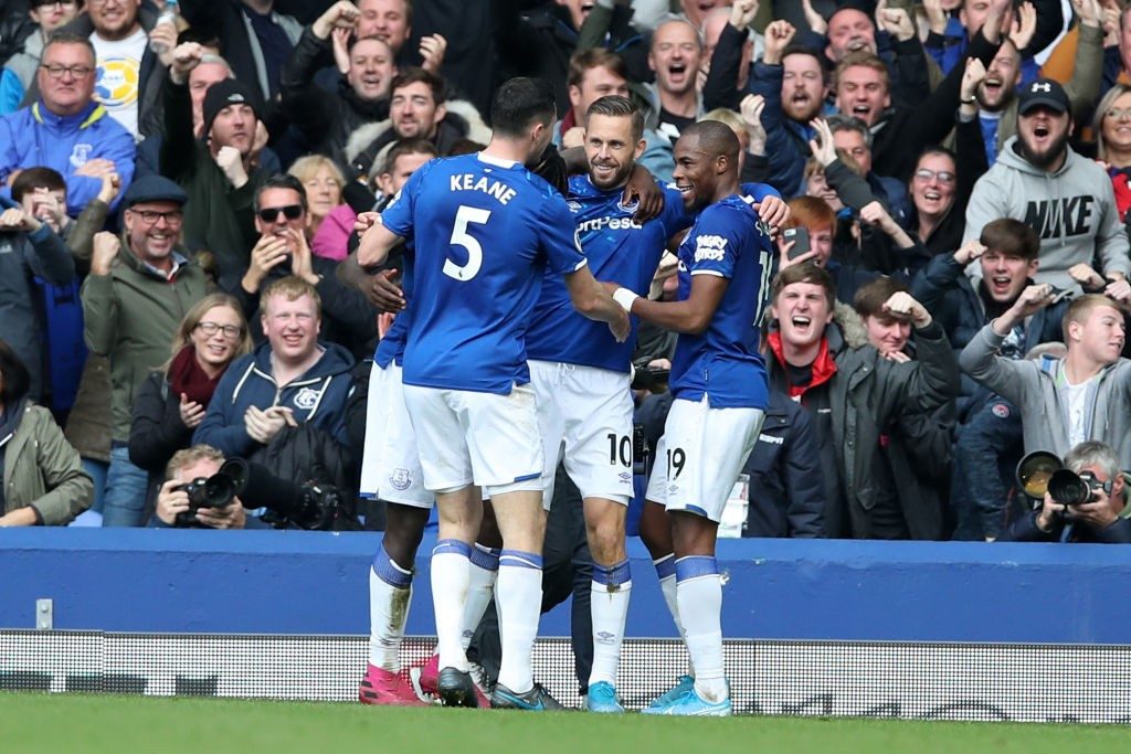 Everton players in action during a premier league encounter.