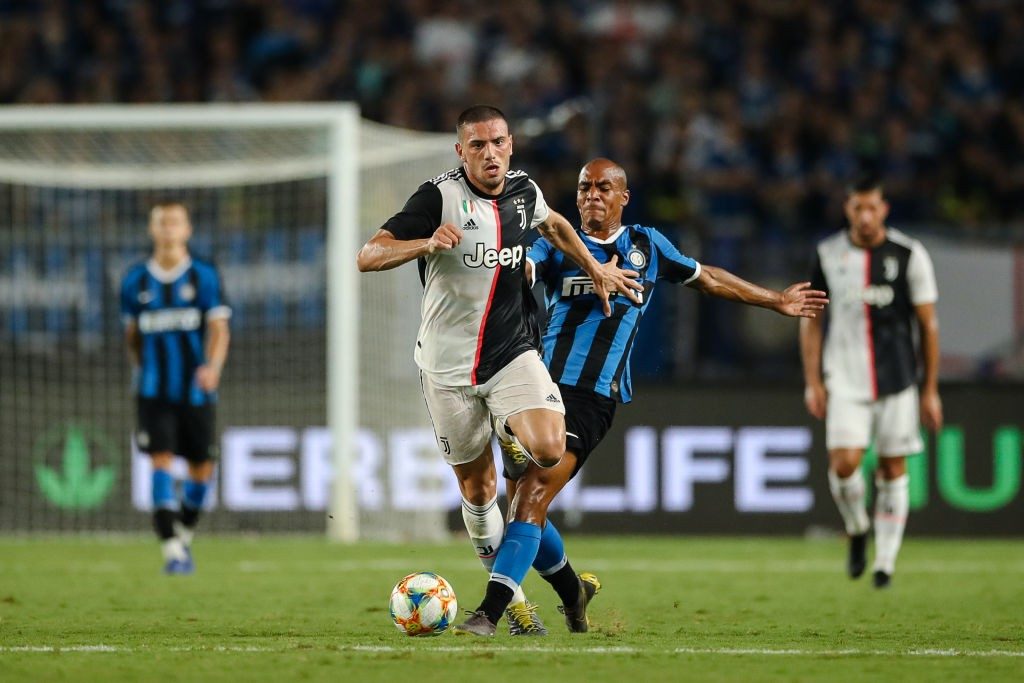 Merih Demiral of Juventus and Joao Mario of FC Internazionale in action during the International Champions Cup match at the Nanjing Olympic Center Stadium.