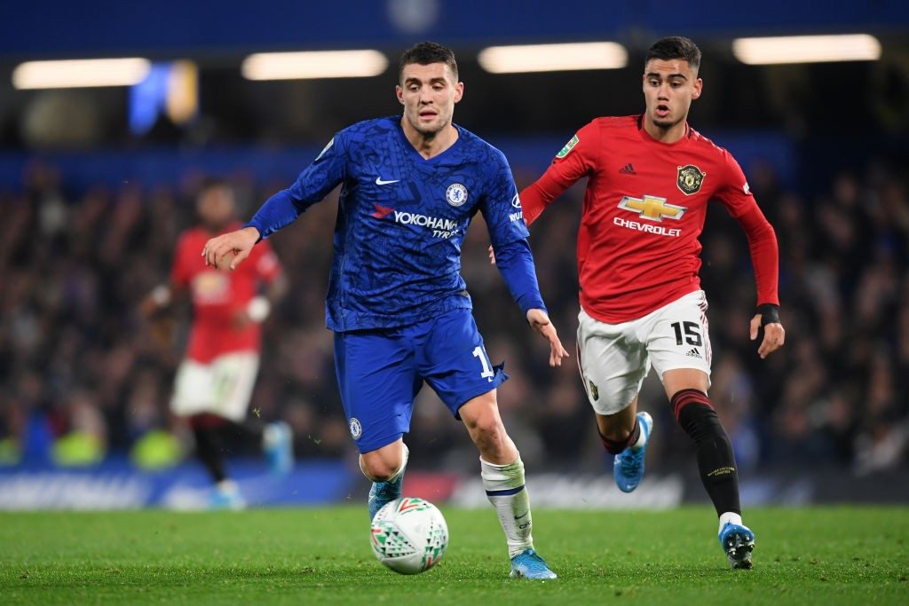 Chelsea's Mateo Kovacic running with the ball in their league game against Manchester United. 